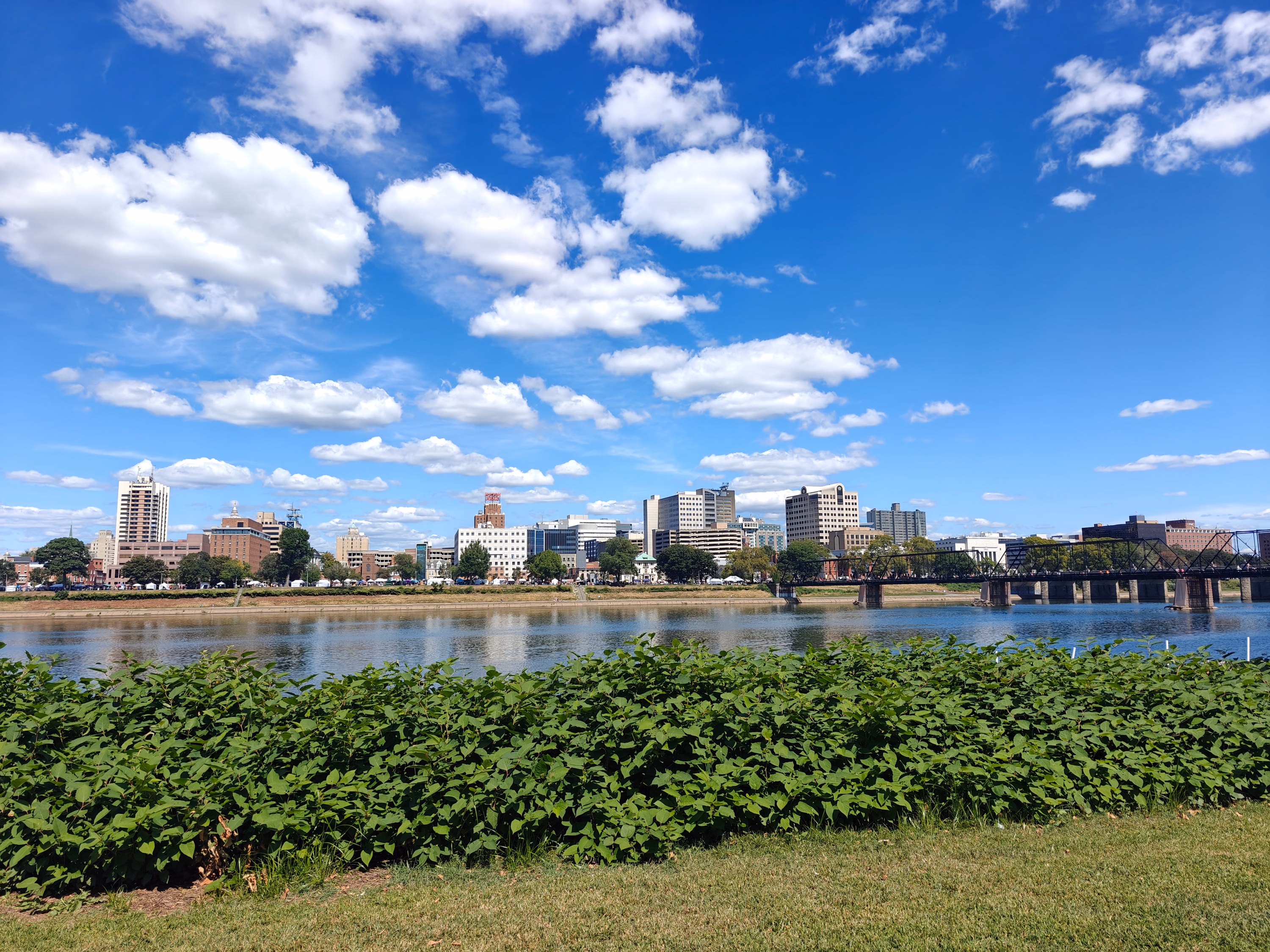 Harrisburg skyline viewed across the Susquehanna River on a clear summer afternoon.